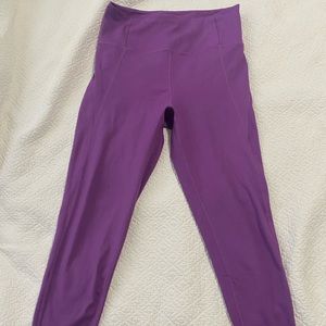 Girlfriend Collective Crop Compressive High-Rise Legging in a pretty purple